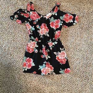 Every floral romper with sleeve cut out